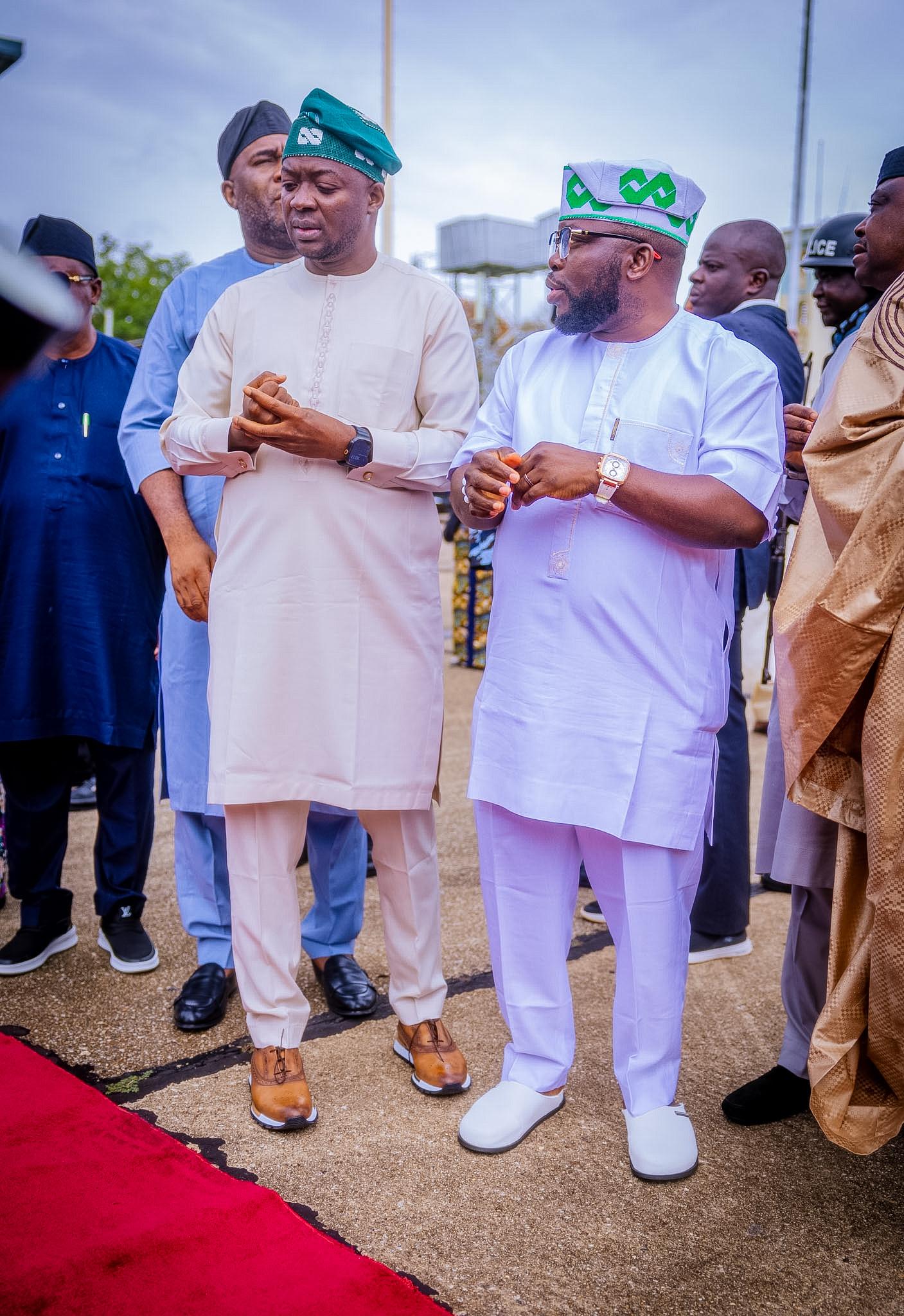 Barji in discussion with colleagues