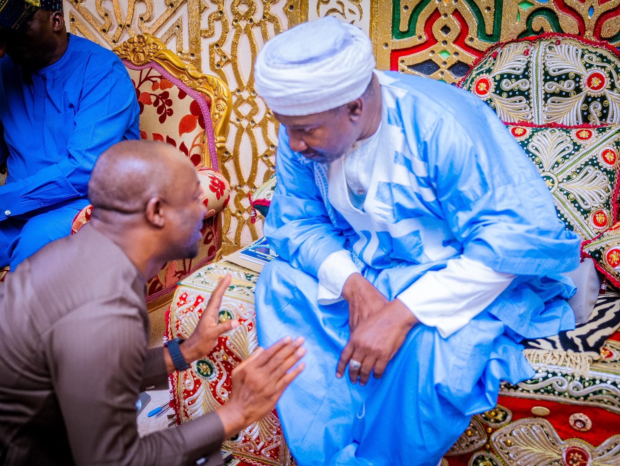 Barji in conversation at a palace