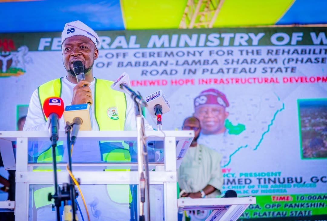 Barji speaking at a federal project event