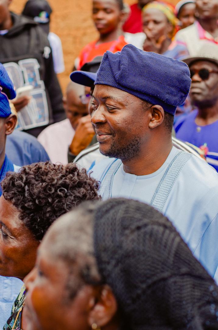 Barji smiling among a crowd