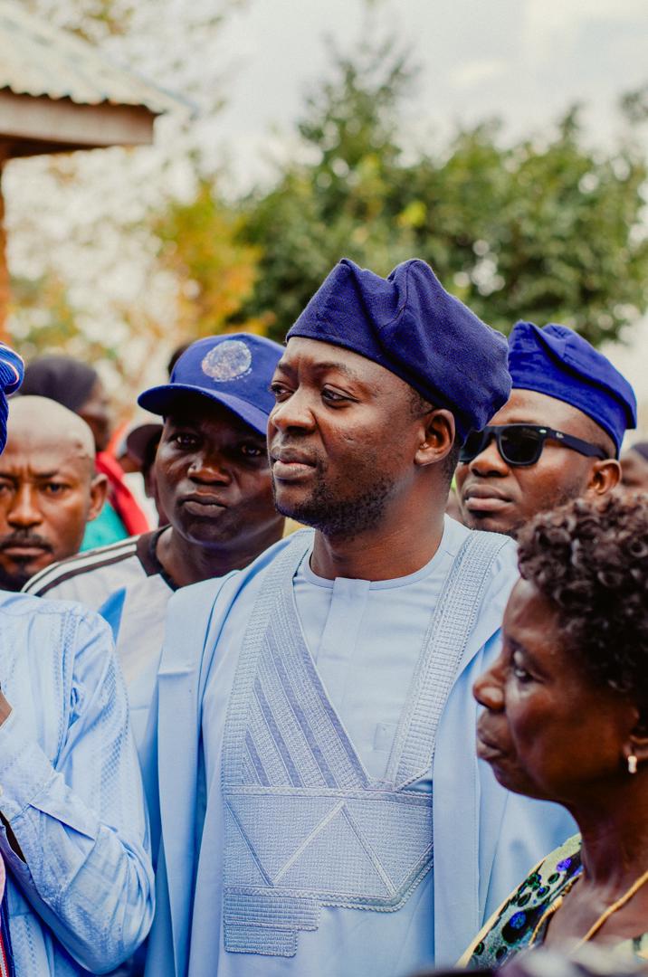Barji among supporters wearing caps