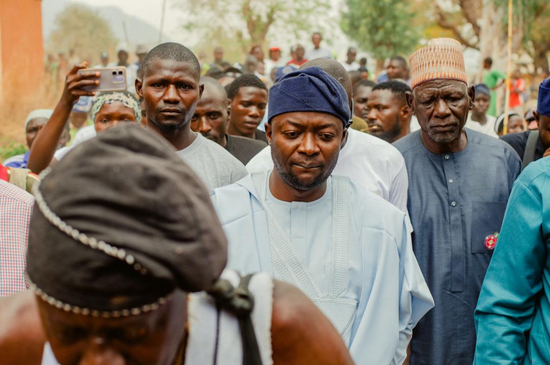 Barji walking through a procession